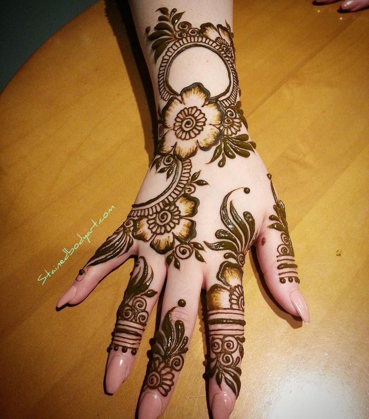 19. Floral Mehndi Design for Fat Arms: